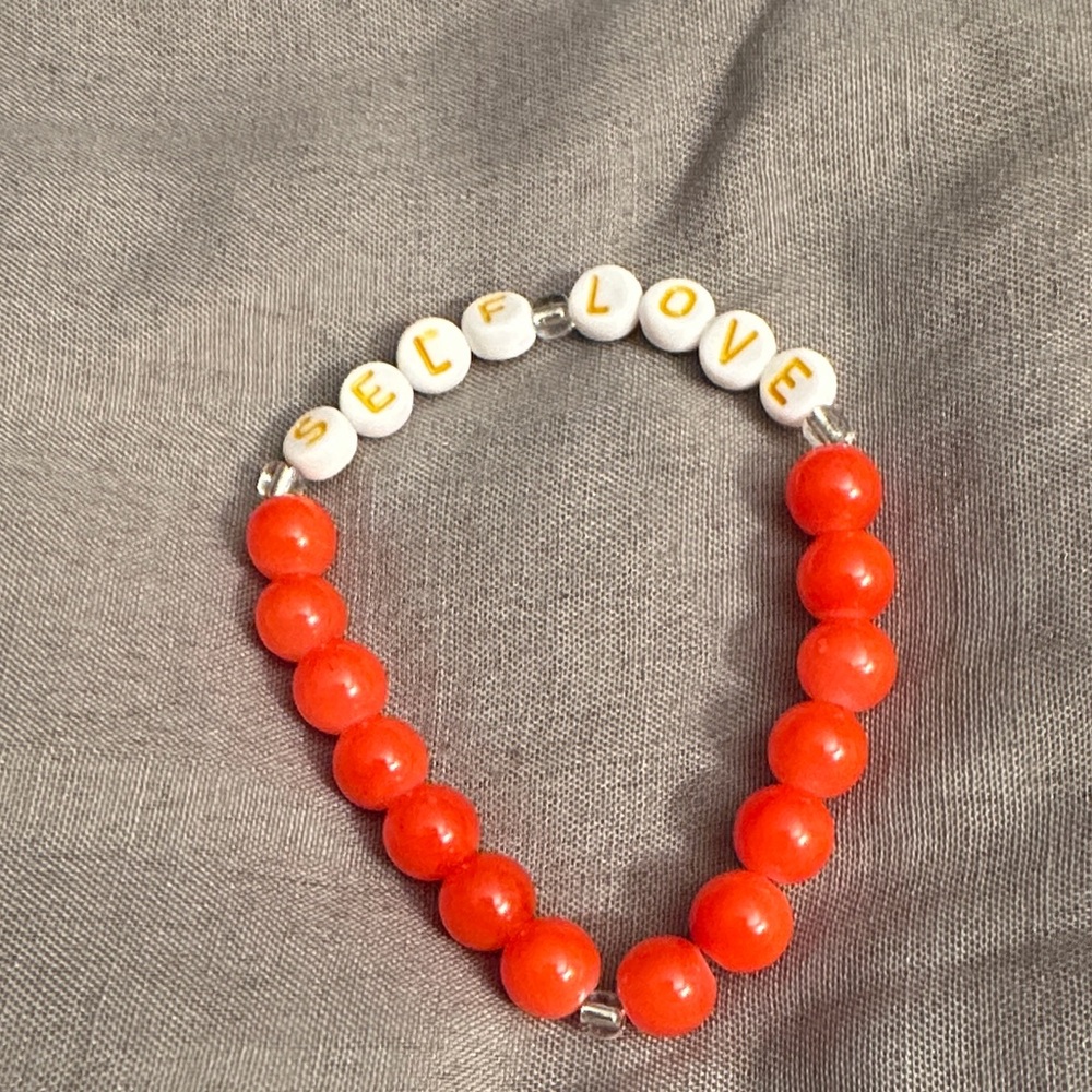 Orange and White Beaded Bracelet